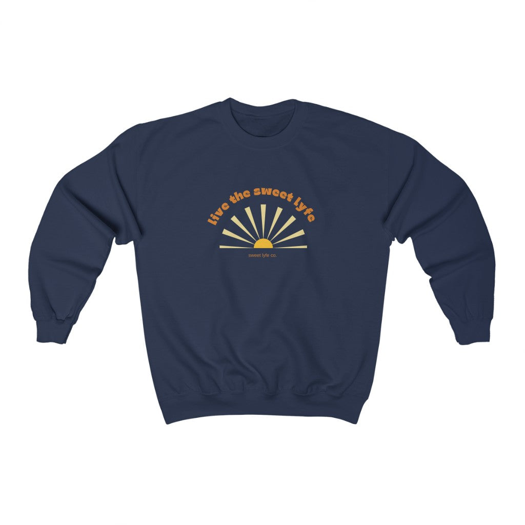 Sunshine is good for the mind, body, adn soul. Live the sunny sweet lyfe with this retro graphic crewneck sweatshirt. With both comfort and style in mind, this sweatshirt is made with a plush cotton that is great for sunny days. Step up your style and add this to your wardrobe today.