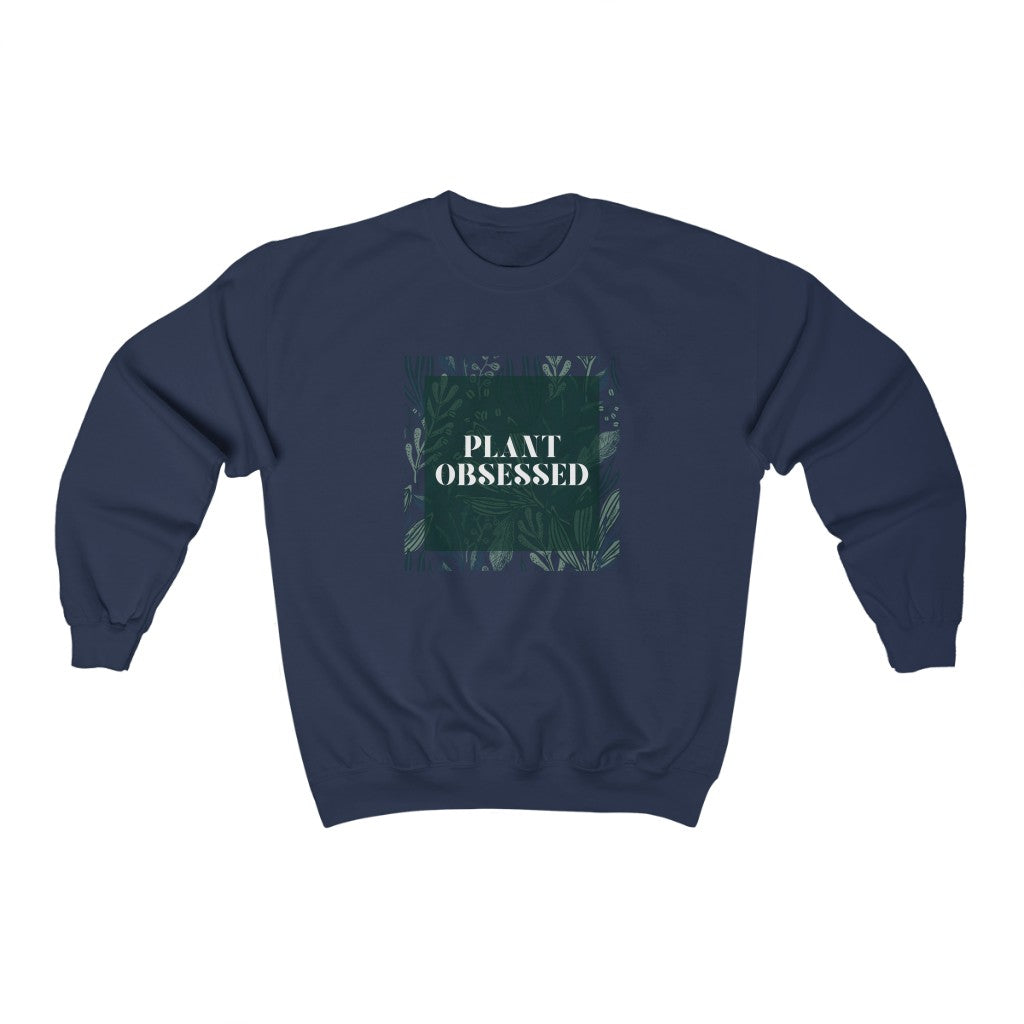 Calling all plant lovers. This plant obsessed crewneck sweatshirt has a gorgeous plant leaf design with the phrase Plant Obsessed. Whether you are just starting out your plant journey or your living space has become a jungle, this sweatshirt is for you.