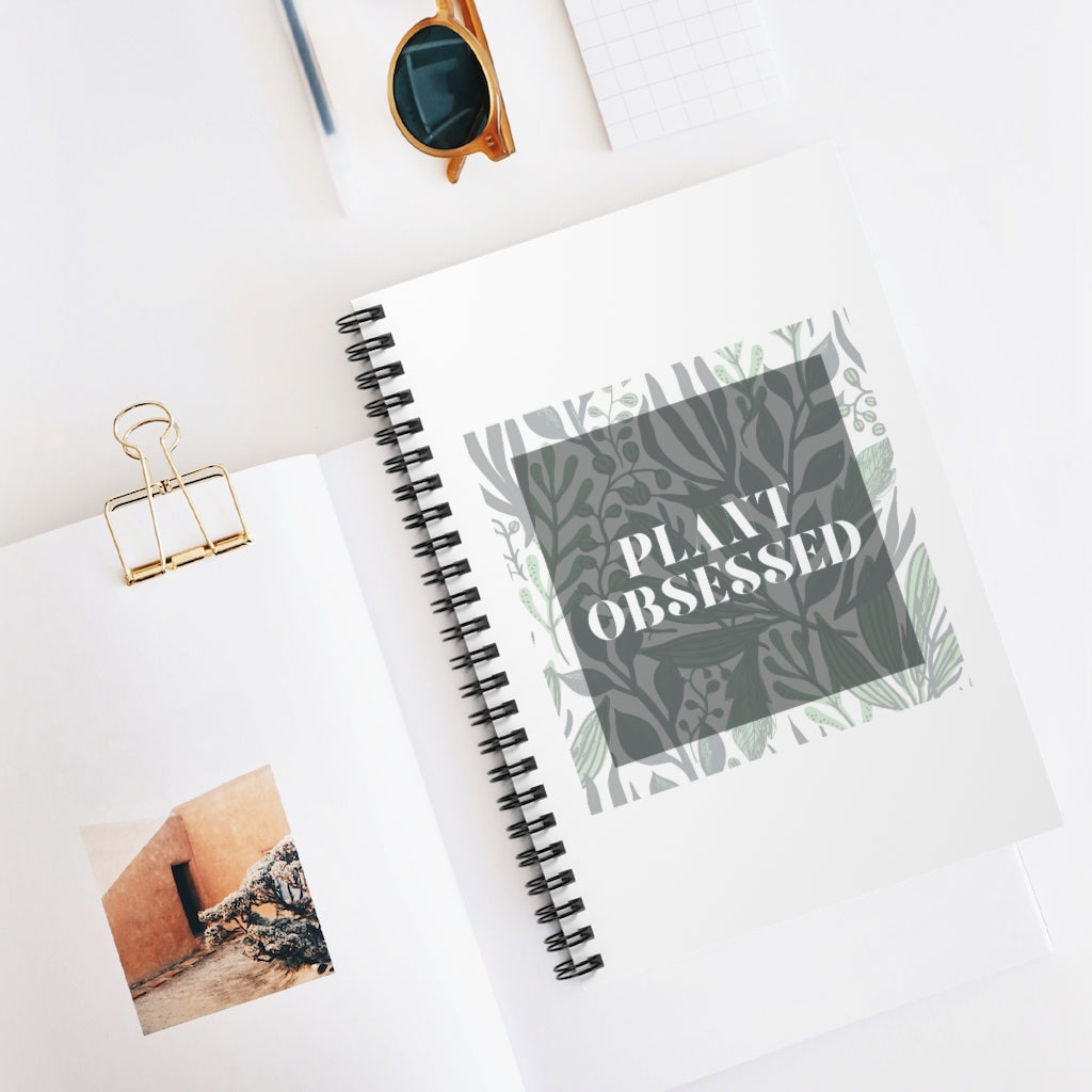Calling all plant lovers. This plant obsessed notebook has a gorgeous plant leaf design with the phrase Plant Obsessed. Whether you are just starting out your plant journey or your living space has become a jungle, this journal is for you.This journal has 118 ruled line single pages for you to fill up!