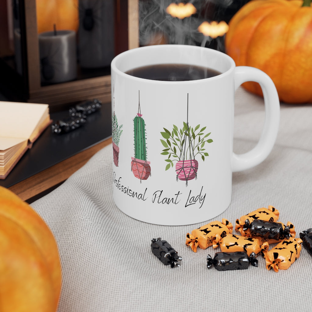 If you have kept your plants alive for more than a week, you are basically a professional. This "Professional Plant Lady" ceramic mug is both stylish and funny. Upgrade your style today with this cute plant lover mug. This mug is 11 oz, lead and BPA free, and microwave and dishwasher safe!