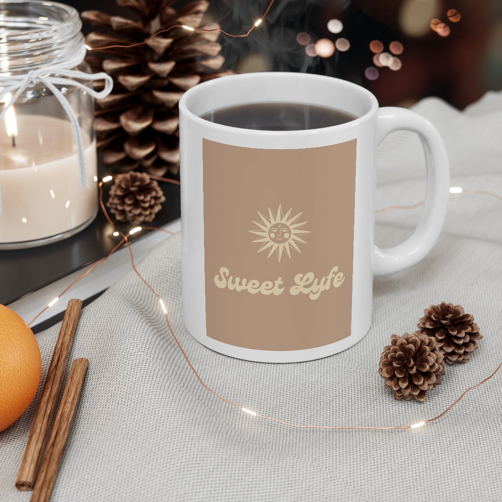 Wherever you go, always bring your own sunshine. This neutral ceramic mug features a sunny design that includes our brand Sweet Lyfe. Upgrade your style and add this mug to your collection today. This mug is 11 oz, lead and BPA free, and microwave and dishwasher safe!