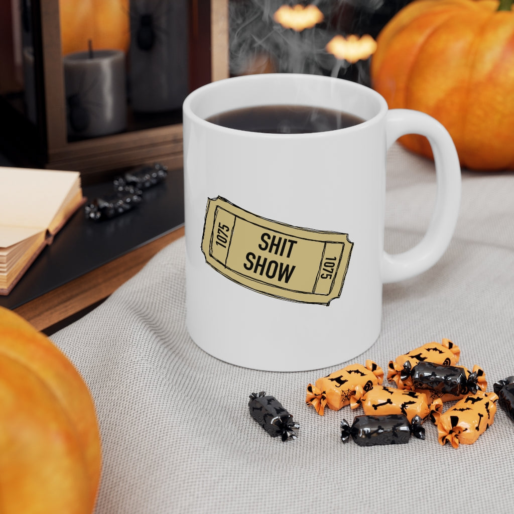 Shit Show...One ticket please! This funny ceramic mug is perfect for those days when you feel like everything is falling apart and life is just a shit show. Cozy up in this mug and handle the day! Perfect for "those" people in your life ;) This mug is 11 oz, lead and BPA free, and microwave and dishwasher safe!