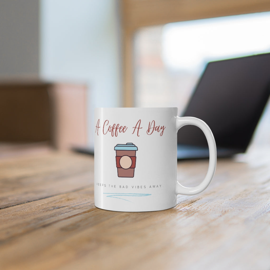 Keep the bad vibes away with a coffee (or two) a day. This funny ceramic mug shows off your love for caffeine. Designed for the girl who loves coffee and has great style. This mug is 11 oz, lead and BPA free, and microwave and dishwasher safe!