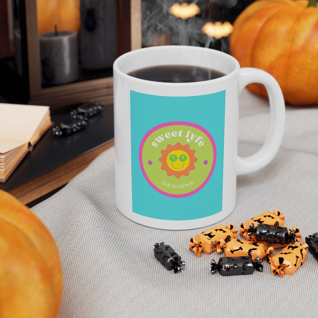 This bright fun colorful ceramic mug has a retro design with a sun wearing sunglasses. With fun pops of color, this cute mug is a unique piece to add to your collection. Make people smile and show off your style and always remember you are living the sweet lyfe. This mug is 11 oz, lead and BPA free, and microwave and dishwasher safe!