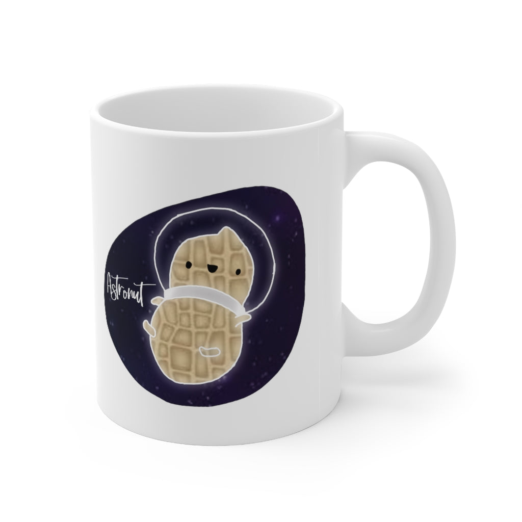What do you get when you cross an astronaut and a peanut?... an Astronut! Show off your sense of humor in this funny, galactic, out of this world ceramic mug. Makes the perfect gift for your punny uncle or for your friend who can't stop making dad jokes! This mug is 11 oz, lead and BPA free, and microwave and dishwasher safe!