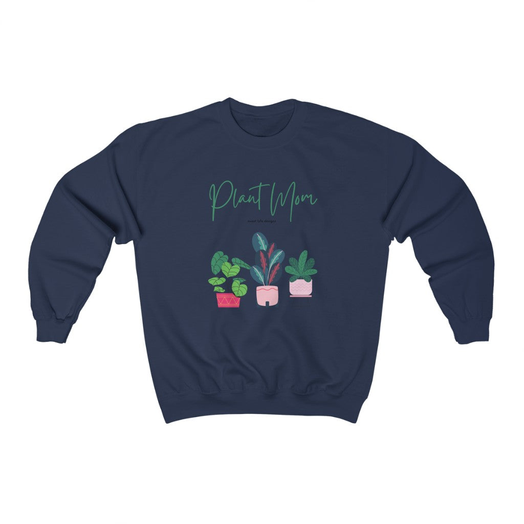 Plant Moms are the best moms. I mean, it is hard to keep plants alive so it must mean you just have the magic touch. This bright and fun crewneck sweatshirt includes potted plants with “Plant Mom” printed across the top. Designed with a super soft cotton, this is the ultimate upgrade to your wardrobe.