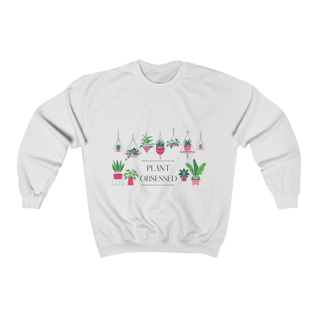 There is no such thing as too many plants. I mean, just one more right? This colorful crewneck sweatshirt has beautiful hanging plants and the phrase “Plant Obsessed”. Made with 100% cotton, this sweatshirt is both stylish and cozy. Treat yourself and show off your passion for plants with this piece.