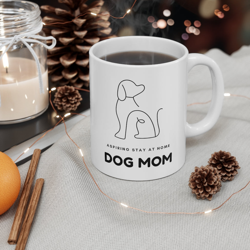 When your only aspiration in life is to make sure your dog has the best life possible. This funny Aspiring Stay at Home Dog Mom ceramic mug is goals. Perfect for coffee and cuddling on the couch with your furry friend, this will be your new favorite mug guaranteed. This mug is 11 oz, lead and BPA free, and microwave and dishwasher safe!