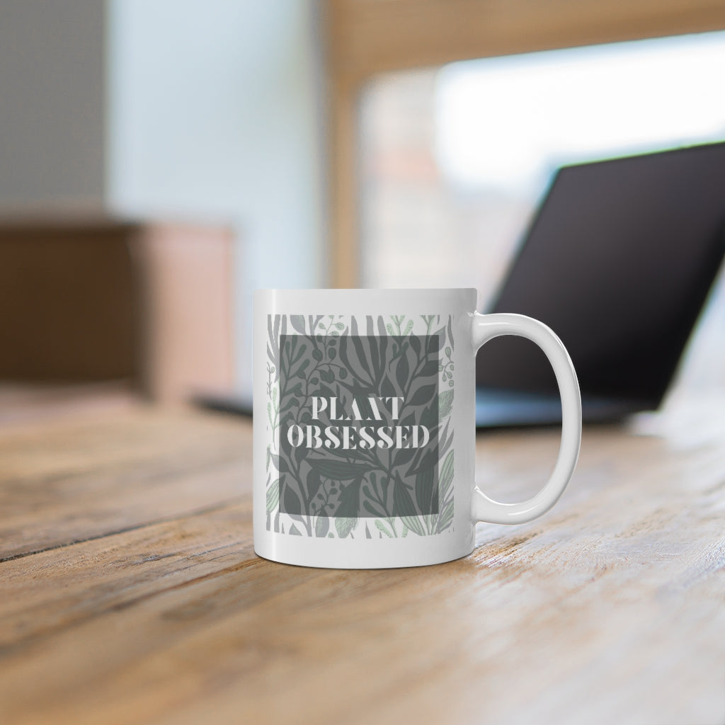 Calling all plant lovers. This plant obsessed ceramic mug has a gorgeous plant leaf design with the phrase Plant Obsessed. Whether you are just starting out your plant journey or your living space has become a jungle, this mug is for you. This mug is 11 oz, lead and BPA free, and microwave and dishwasher safe!