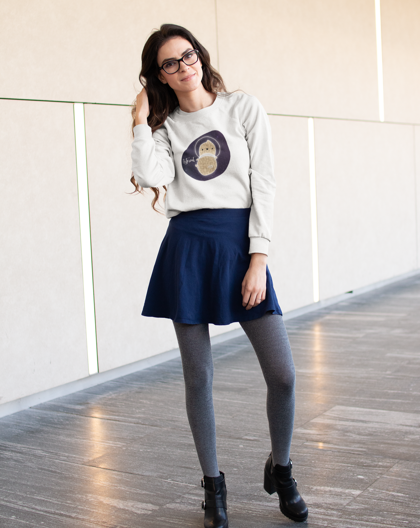 What do you get when you cross an astronaut and a peanut?... an Astronut! Show off your sense of humor in this funny, galactic, out of this world crewneck sweatshirt. Makes the perfect gift for your punny uncle or for your friend who can't stop making dad jokes!