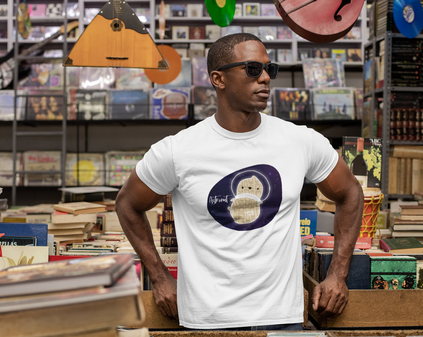 What do you get when you cross an astronaut and a peanut?... an Astronut! Show off your sense of humor in this funny, galactic, out of this world cotton t-shirt. Makes the perfect gift for your punny uncle or for your friend who can't stop making dad jokes!