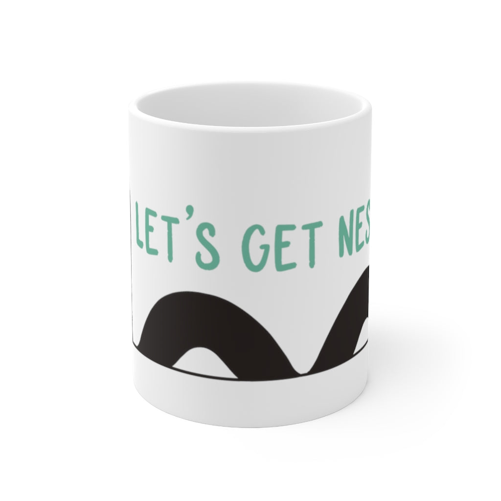 Let’s Get Nessie! This Loch Ness Monster inspired ceramic mug is perfect for those nights getting messy searching for the mysterious Nessie. This mug is 11 oz, lead and BPA free, and microwave and dishwasher safe!