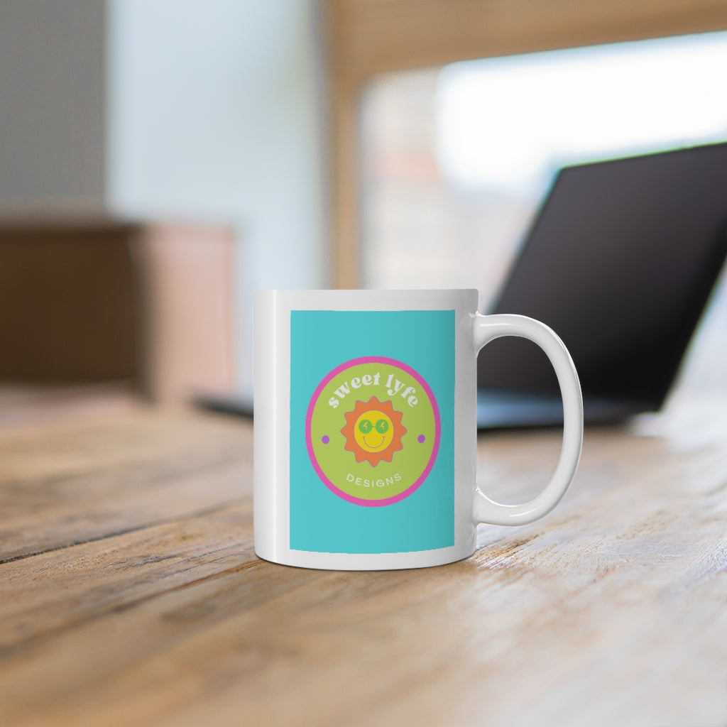 This bright fun colorful ceramic mug has a retro design with a sun wearing sunglasses. With fun pops of color, this cute mug is a unique piece to add to your collection. Make people smile and show off your style and always remember you are living the sweet lyfe. This mug is 11 oz, lead and BPA free, and microwave and dishwasher safe!