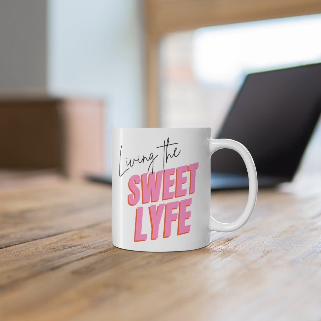Living the sweet lyfe in a sunny state of mind. This ceramic mug gives off girly vibes. With light pink lettering, you can make your morning pop and show off your trendy side. Grab this mug and let the compliments roll in and keep the good times going. This mug is 11 oz, lead and BPA free, and microwave and dishwasher safe!