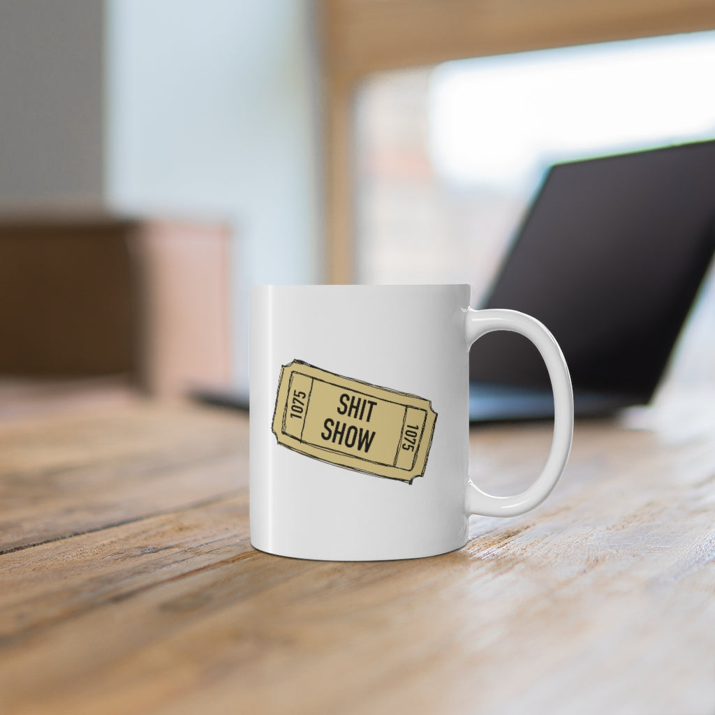 Shit Show...One ticket please! This funny ceramic mug is perfect for those days when you feel like everything is falling apart and life is just a shit show. Cozy up in this mug and handle the day! Perfect for "those" people in your life ;) This mug is 11 oz, lead and BPA free, and microwave and dishwasher safe!