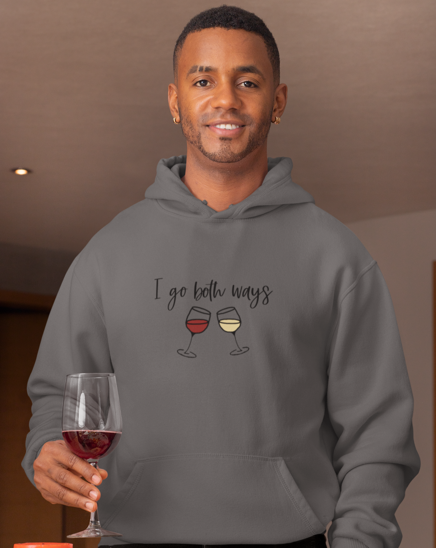 I go both ways! This funny hoodie sweatshirt is perfect for all you wine lovers out there. If you don't discriminate when it comes to white wine or red wine, this hoodie is for you. Great for those chilly days out at the vineyards, or just cozying up at home with your favorite glass of wine.