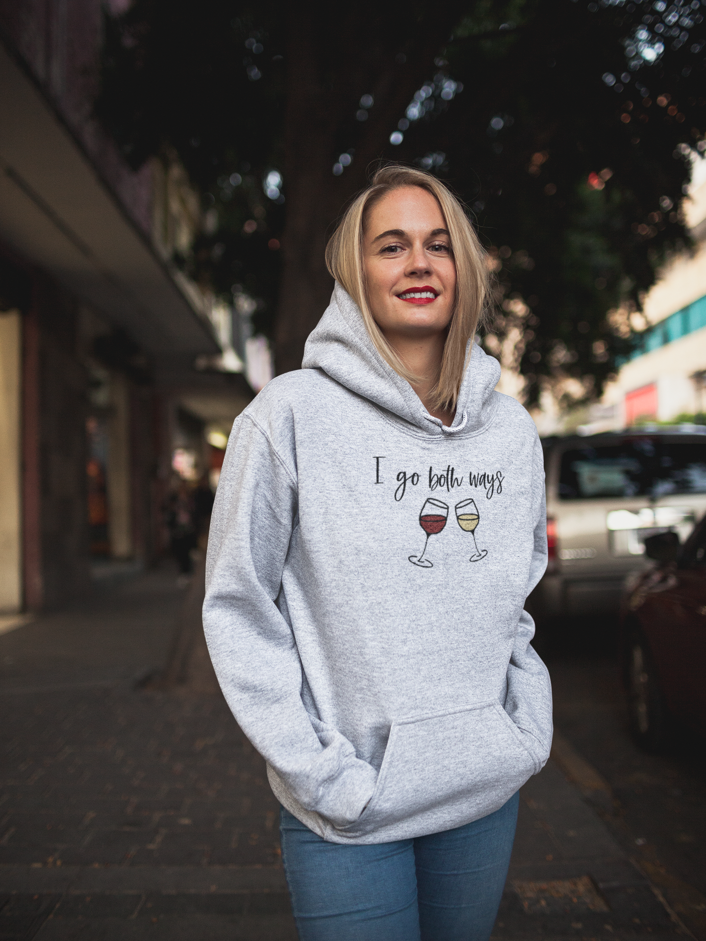 I go both ways! This funny hoodie sweatshirt is perfect for all you wine lovers out there. If you don't discriminate when it comes to white wine or red wine, this hoodie is for you. Great for those chilly days out at the vineyards, or just cozying up at home with your favorite glass of wine.