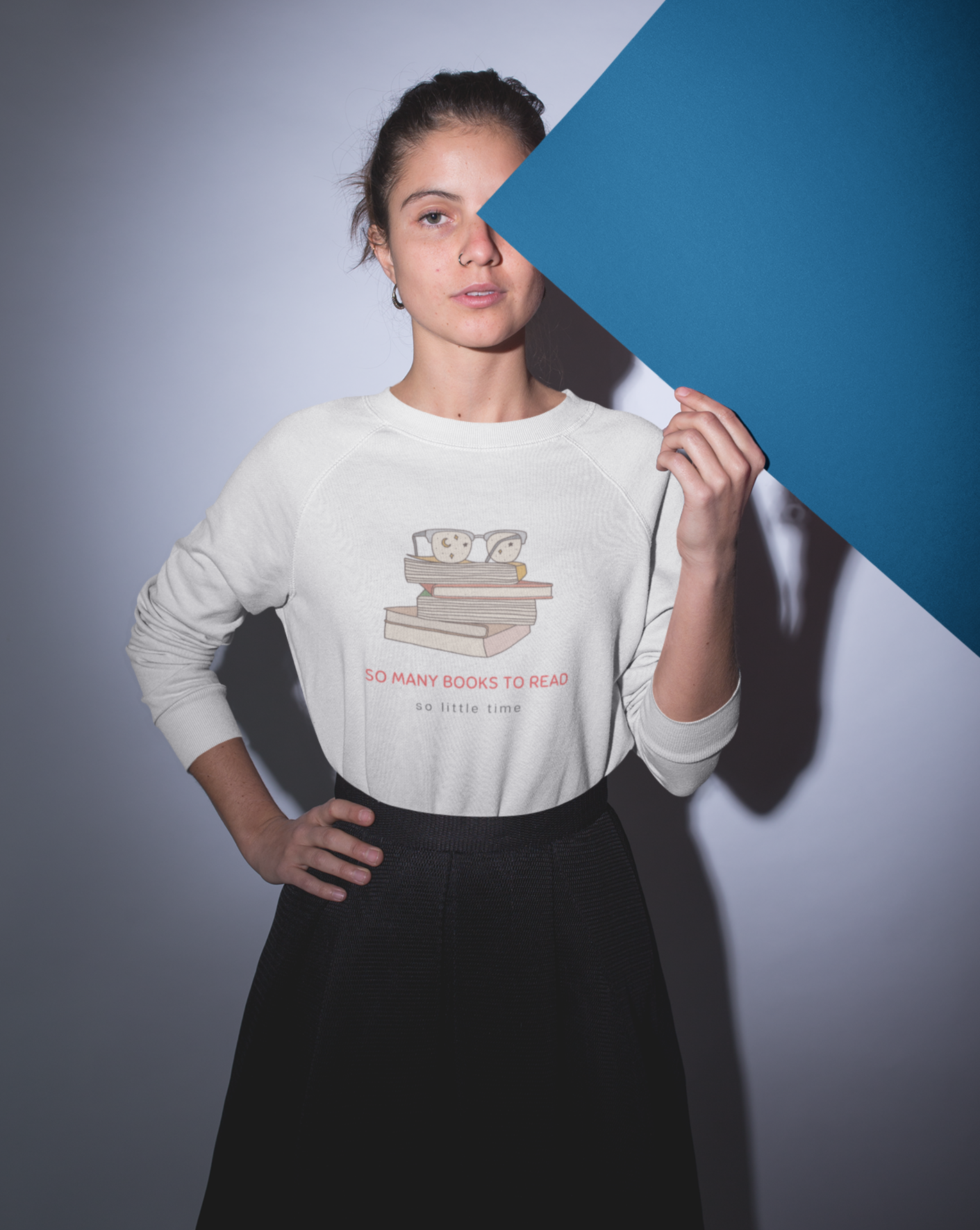 To all the book lovers out there, this crewneck sweatshirt is for you! Inspired by bookworms everywhere, this cotton t-shirt has a cute book design with the phrase “So Many Books To Read So Little Time”. Made with a super soft cotton, this stylish sweatshirt is great for snuggling up on the couch with a new book in hand. This is a great gift idea for your bookclub or anyone who is a reader.