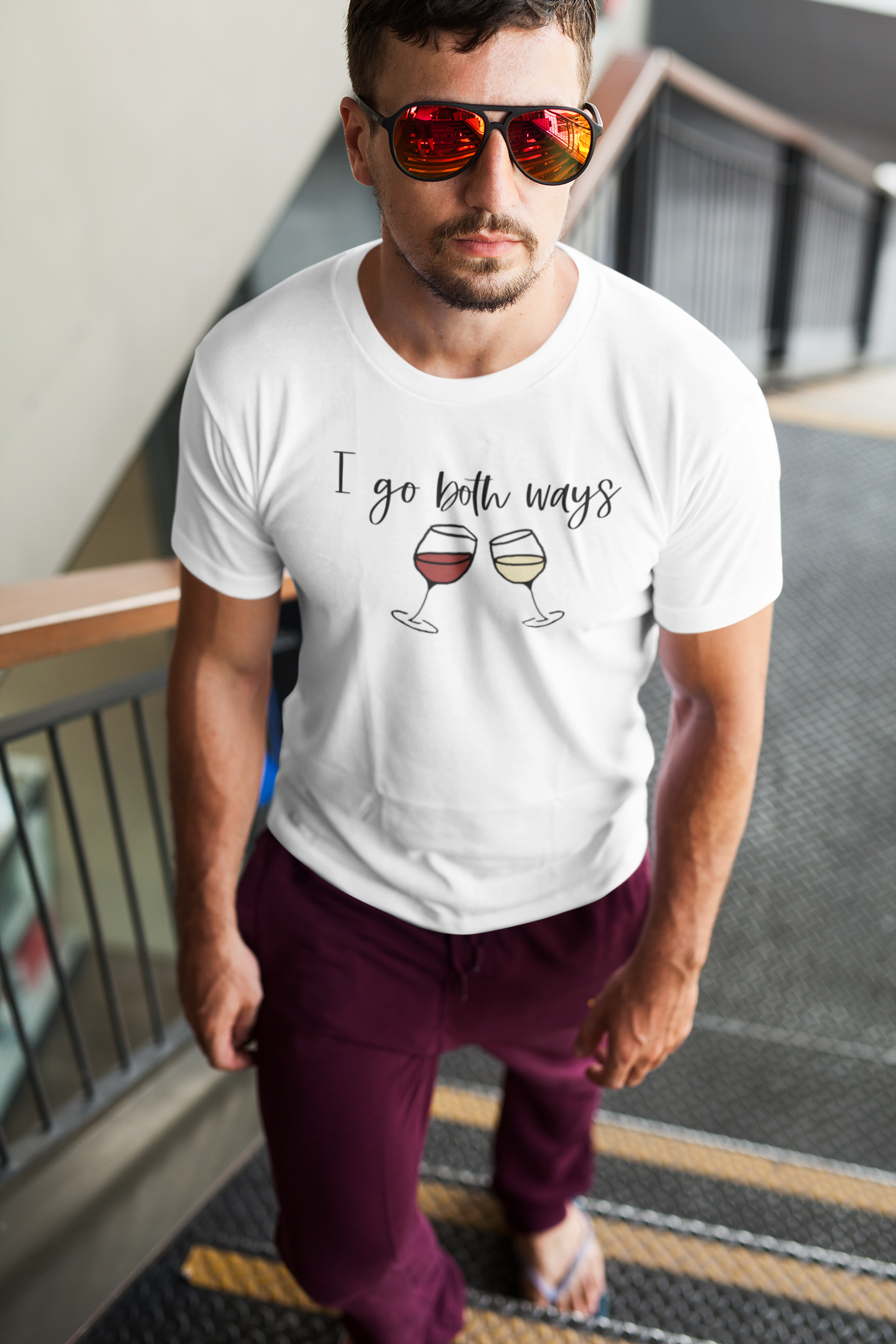 I go both ways! This funny cotton t-shirt is perfect for all you wine lovers out there. If you don't discriminate when it comes to white wine or red wine, this crew is for you. Great for those days out at the vineyards, or just cozying up at home with your favorite glass of wine.
