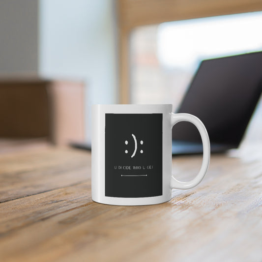 The you decide who you get smiley face ceramic mug is perfect for people who can't hide their emotions on their face. This smiley face will let people know up front your personality in a fun and sassy way. The edgy modern graphic will fit easily onto your daily accessories! This mug is 11 oz, lead and BPA free, and microwave and dishwasher safe!