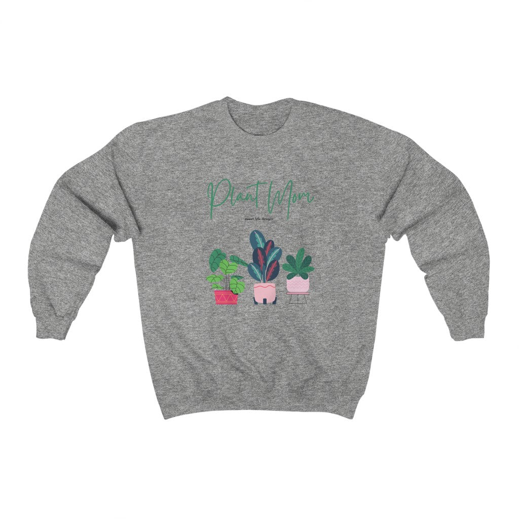 Plant Moms are the best moms. I mean, it is hard to keep plants alive so it must mean you just have the magic touch. This bright and fun crewneck sweatshirt includes potted plants with “Plant Mom” printed across the top. Designed with a super soft cotton, this is the ultimate upgrade to your wardrobe.