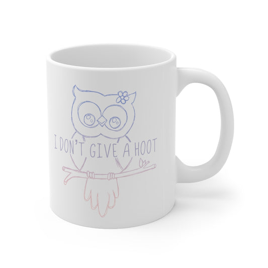 I Don't Give a Hoot! This funny ceramic mug is a great way to show your personal sense of humor and your love for cute owls! Also makes a perfect gift for that punny friend in your life! This mug is 11 oz, lead and BPA free, and microwave and dishwasher safe! 