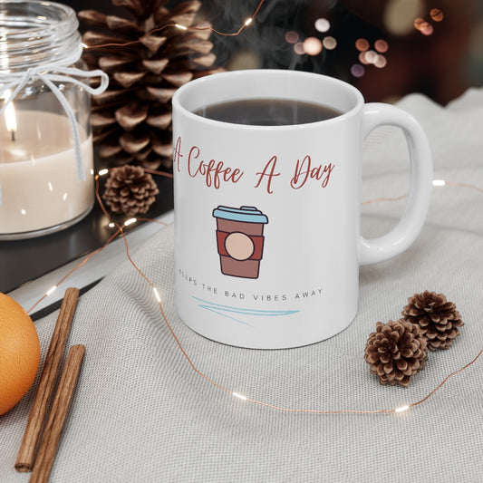 Keep the bad vibes away with a coffee (or two) a day.  This funny ceramic mug shows off your love for caffeine. Designed for the girl who loves coffee and has great style.  This mug is 11 oz, lead and BPA free, and microwave and dishwasher safe! 