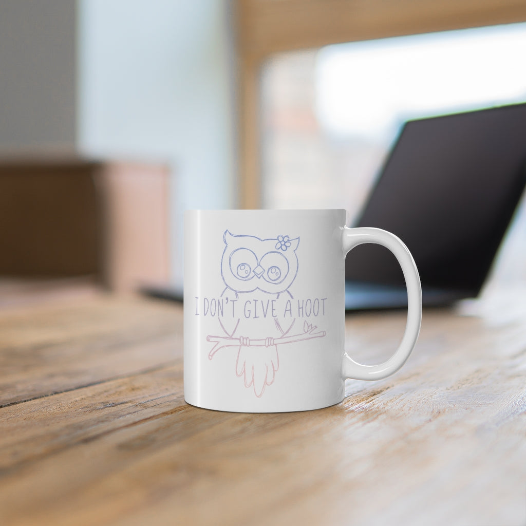 I Don't Give a Hoot! This funny ceramic mug is a great way to show your personal sense of humor and your love for cute owls! Also makes a perfect gift for that punny friend in your life! This mug is 11 oz, lead and BPA free, and microwave and dishwasher safe! 