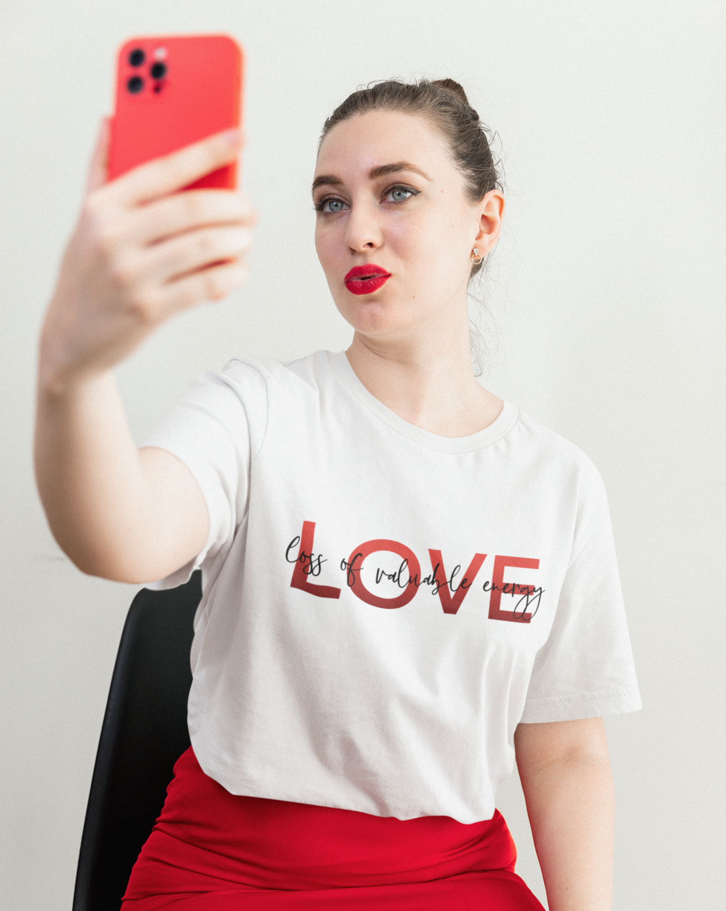 LOVE - Loss of Valuable Energy! Am I Right? This cotton t-shirt is perfect for sitting at home drinking wine while being skeptical of love! Say what all us single people are thinking with this t-shirt!