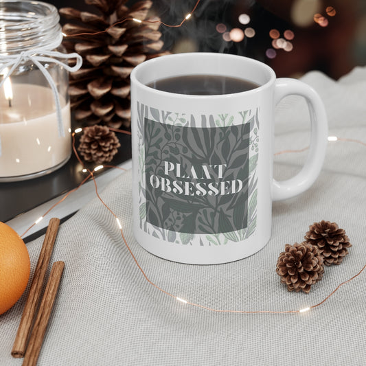 Calling all plant lovers. This plant obsessed ceramic mug has a gorgeous plant leaf design with the phrase Plant Obsessed. Whether you are just starting out your plant journey or your living space has become a jungle, this mug is for you. This mug is 11 oz, lead and BPA free, and microwave and dishwasher safe!