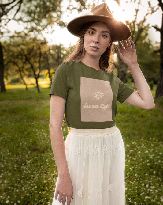 Wherever you go, always bring your own sunshine. This neutral cotton t-shirt features a sunny design that includes our brand Sweet Lyfe. Made with a soft high quality cotton for next level comfort. Upgrade your style and add this t-shirt to your wardrobe today.