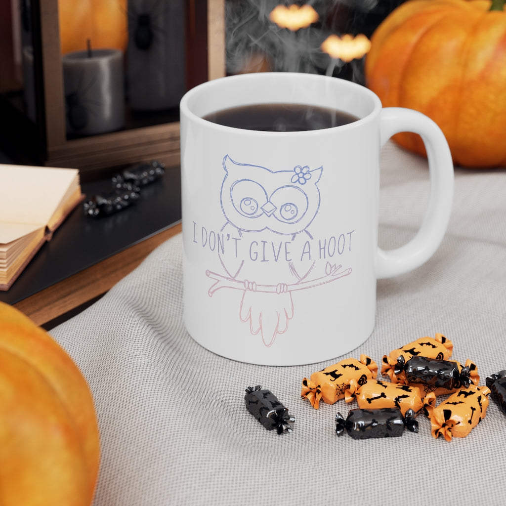 I Don't Give a Hoot! This funny ceramic mug is a great way to show your personal sense of humor and your love for cute owls! Also makes a perfect gift for that punny friend in your life! This mug is 11 oz, lead and BPA free, and microwave and dishwasher safe! 