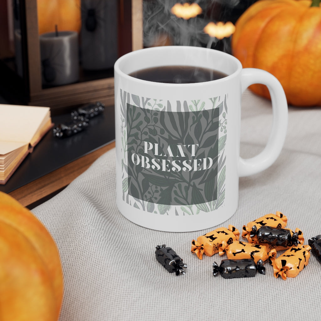 Calling all plant lovers. This plant obsessed ceramic mug has a gorgeous plant leaf design with the phrase Plant Obsessed. Whether you are just starting out your plant journey or your living space has become a jungle, this mug is for you. This mug is 11 oz, lead and BPA free, and microwave and dishwasher safe! 