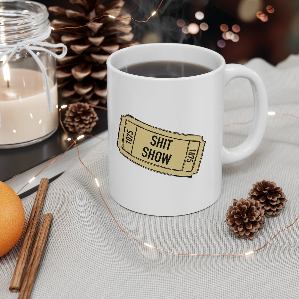 Shit Show...One ticket please! This funny ceramic mug is perfect for those days when you feel like everything is falling apart and life is just a shit show.  Cozy up in this mug and handle the day! Perfect for "those" people in your life ;) This mug is 11 oz, lead and BPA free, and microwave and dishwasher safe! 