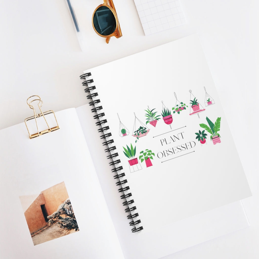There is no such thing as too many plants. I mean, just one more right? This colorful notebook has beautiful hanging plants and the phrase “Plant Obsessed”. Treat yourself and show off your passion for plants with this journal. This journal has 118 ruled line single pages for you to fill up!