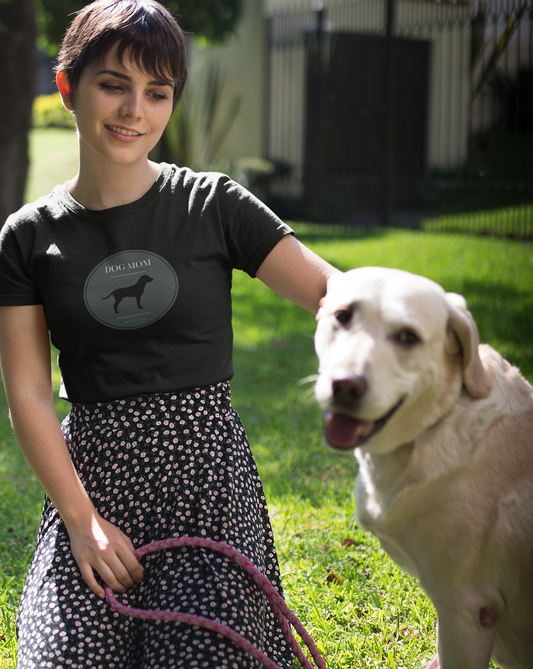 There is nothing better than a girl's best friend. This stylish dog mom cotton t-shirt has a preppy emblem with a dog. Whether you are walking your furry friend or snuggling up on the couch with your dog, this t-shirt is perfect for any and every occasion. Designed with a super soft cotton, you will never want to take it off.