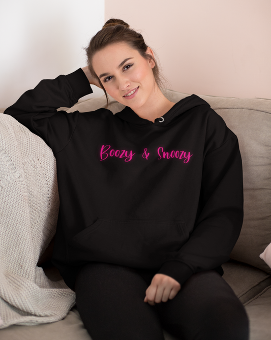 Boozy and Snoozy! Sleepy but still need a drink? This hoodie sweatshirt is perfect for brunch with the girls or a great gift for your boozy friends. After a long nigth out partying you can throw on this festive hoodie to make your way through the day.