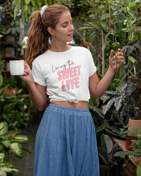 Living the sweet lyfe in a sunny state of mind. This cotton t-shirt gives off girly vibes. With light pink lettering, you can make your outfit pop and show off your trendy side at the same time. Put on this t-shirt and let the compliments roll in and keep the good times going.