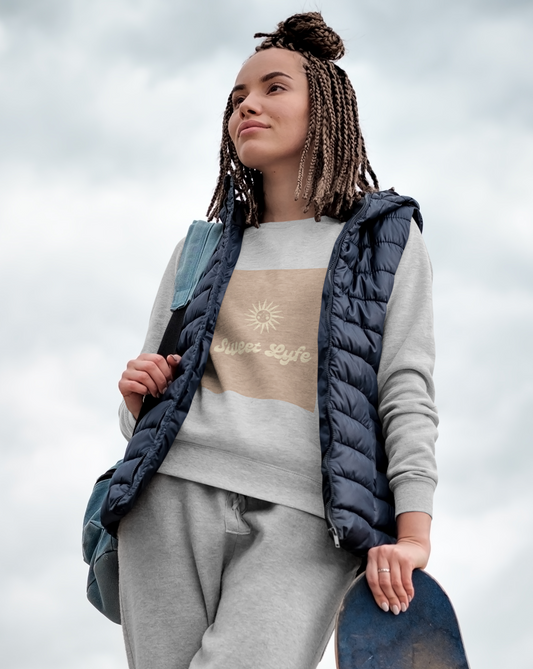 Wherever you go, always bring your own sunshine. This neutral crewneck sweatshirt features a sunny design that includes our brand Sweet Lyfe. Made with a soft high quality cotton for next elvel comfort. Upgrade your style and add this sweatshirt to your wardrobe today.