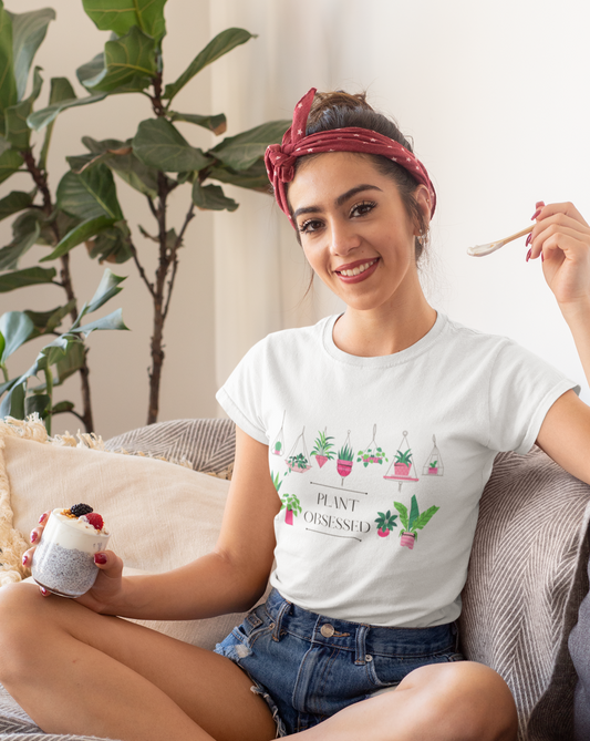 There is no such thing as too many plants. I mean, just one more right? This colorful cotton tee has beautiful hanging plants and the phrase “Plant Obsessed”. Made with 100% cotton, this t-shirt is both stylish and cozy. Treat yourself and show off your passion for plants with this piece.