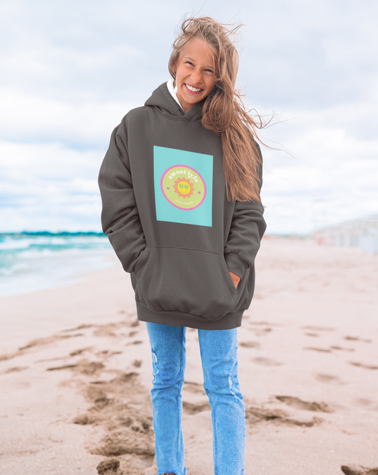 This bright fun colorful hoodie has a retro design with a sun wearing sunglasses.  With fun pops of color, this cute graphic sweatshirt is a unique piece to add to your collection.  Make people smile and show off your style and always remember you are living the sweet lyfe.