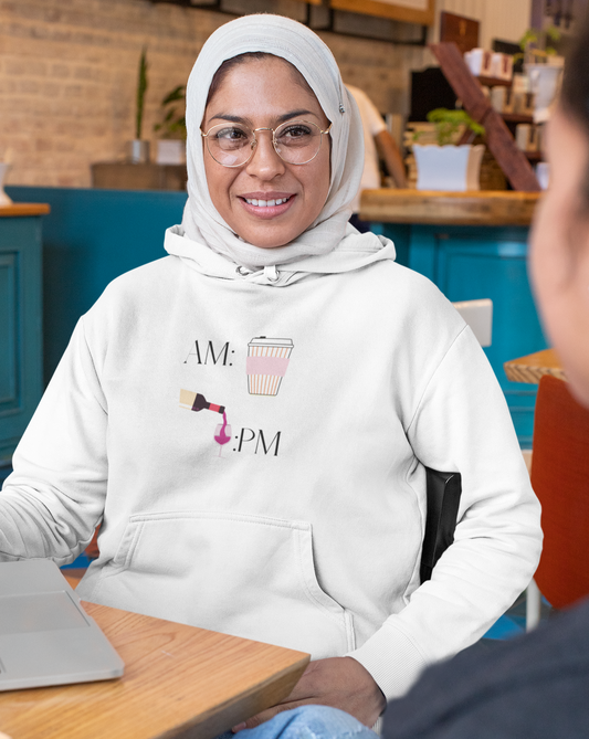 This cute hoodie shows off your schedule... coffee in the morning and wine at night, there is no other way. With bright pinks and reds, this sweatshirt stands out and is a perfect cozy piece to add to your collection. Designed with a luxurious cotton, you will never want to take it off.