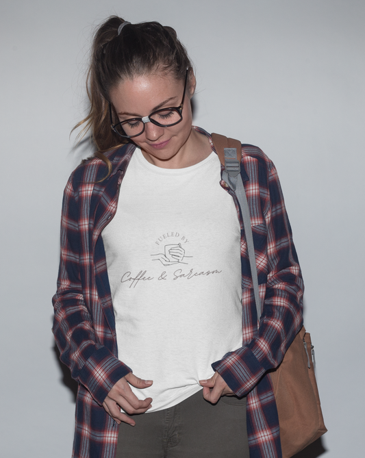 Fueled by coffee and sarcasm, that's all there is to it. Show off your love for coffee and sass with this graphic t-shirt. Designed with a soft cotton, you can stay comfortable on your way to the coffee shop with a whole bunch of attitude.