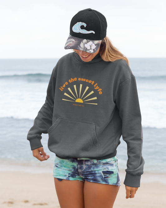 Sunshine is good for the mind, body, and soul. Live the sunny sweet lyfe with this retro graphic hoodie. With both comfort and style in mind, this sweatshirt is made with a plush cotton that is great for sunny days. Step up your style and add this to your wardrobe today.