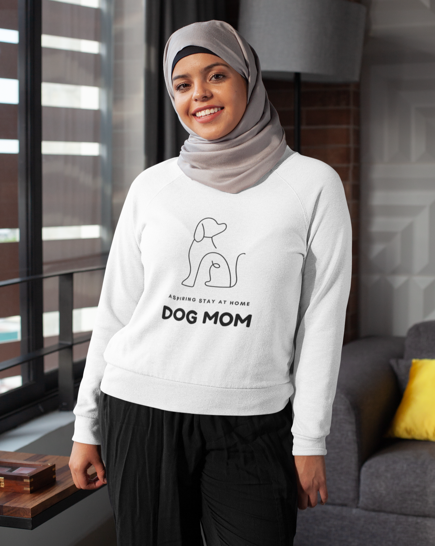 When your only aspiration in life is to make sure your dog has the best life possible.  This funny Aspiring Stay at Home Dog Mom crewneck sweatshirt is made with 100% cotton blend so it is super soft and comfortable. Perfect for morning walks or cuddling on the couch with your furry friend, this will be your new favorite sweatshirt guaranteed. 