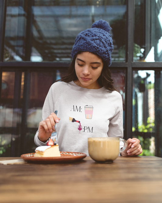 This cute crewneck sweatshirt shows off your schedule... coffee in the morning and wine at night, there is no other way. With bright pinks and reds, this sweatshirt stands out and is a perfect cozy piece to add to your collection. Designed with a luxurious cotton, you will never want to take it off.