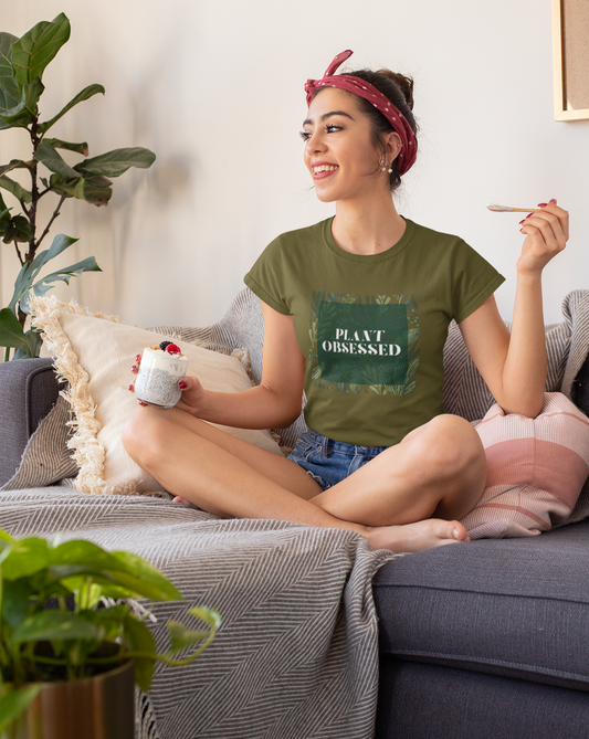 Calling all plant lovers. This plant obsessed cotton t-shirt has a gorgeous plant leaf design with the phrase Plant Obsessed. Whether you are just starting out your plant journey or your living space has become a jungle, this t-shirt is for you.