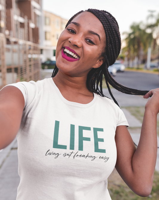 LIFE...Living isn't fricking easy! This funny cotton t-shirt is a great way to show your personal sense of humor! Also makes a perfect gift for that funny friend in your life!