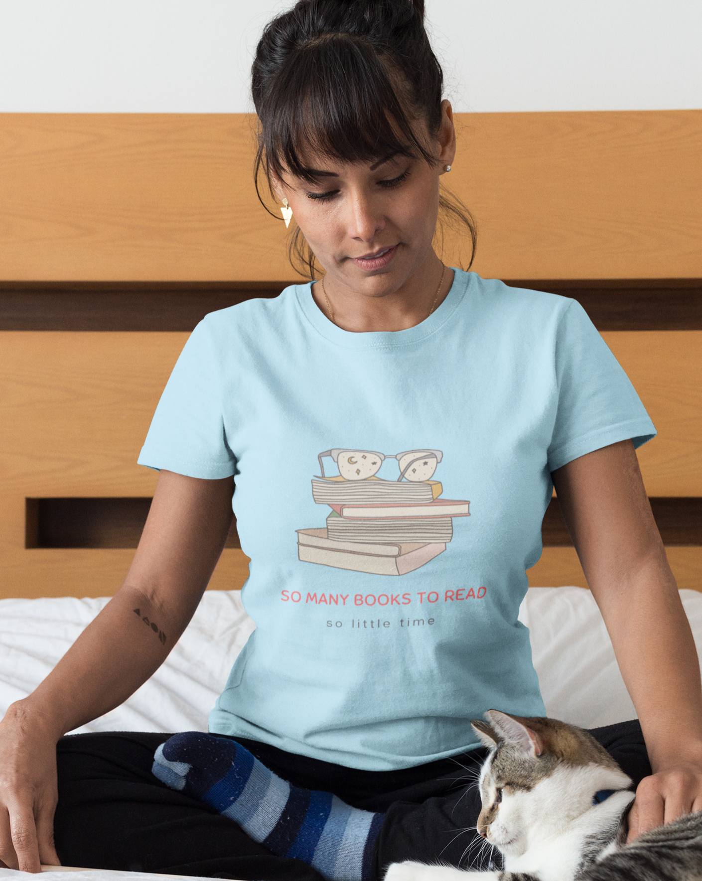 To all the book lovers out there, this t-shirt is for you! Inspired by bookworms everywhere, this cotton t-shirt has a cute book design with the phrase “So Many Books To Read So Little Time”. Made with a super soft cotton, this stylish t-shirt is great for snuggling up on the couch with a new book in hand. This is a great gift idea for your bookclub or anyone who is a reader.